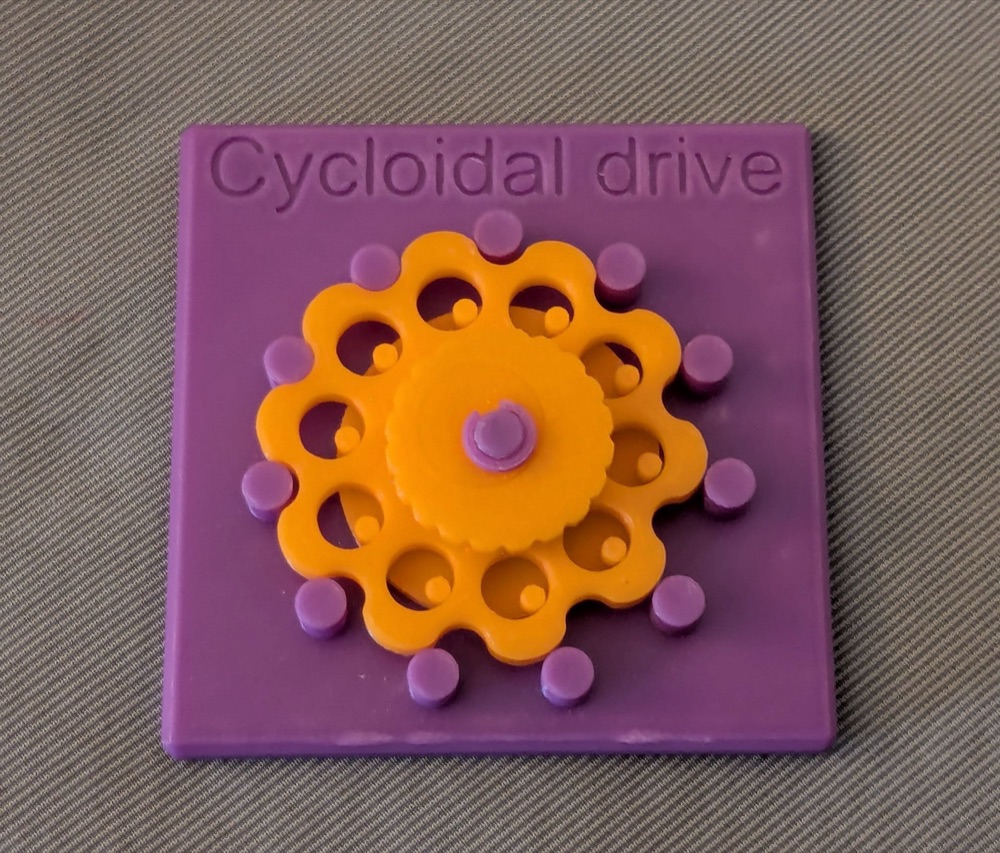 Sikloidal Redüktör Eğitici Modeli (Merkezi Düğme Girişli, Pimli Disk Çıkışlı)