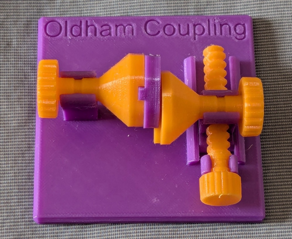 Oldham Kaplini Eğitici Modeli (Paralel Ama Hizasız İki Mil Arasında Dönüş İletir)