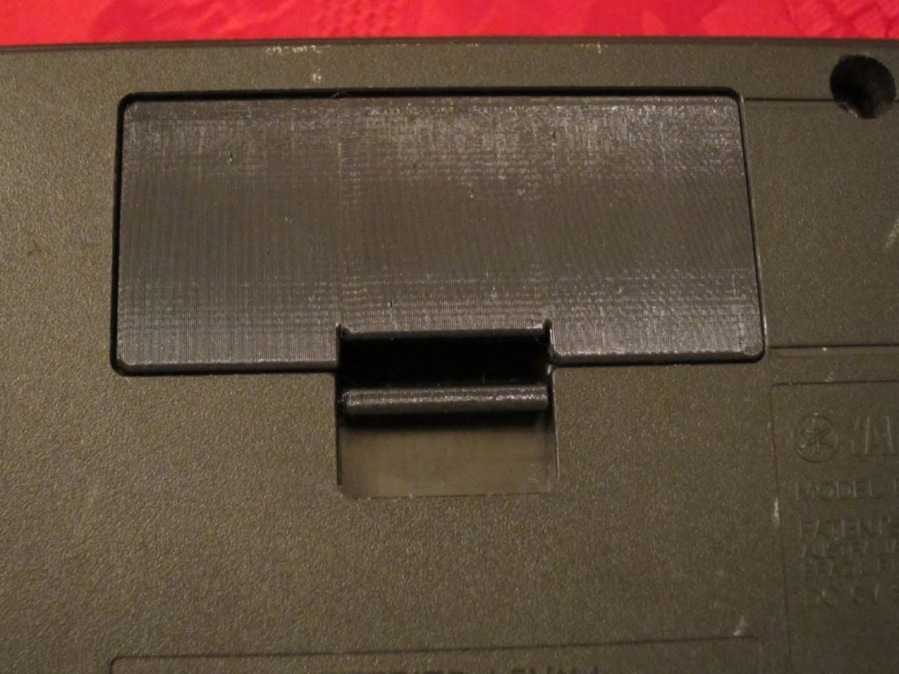 Yamaha PSS-130 Klavye Pil Kapağı görsel 2