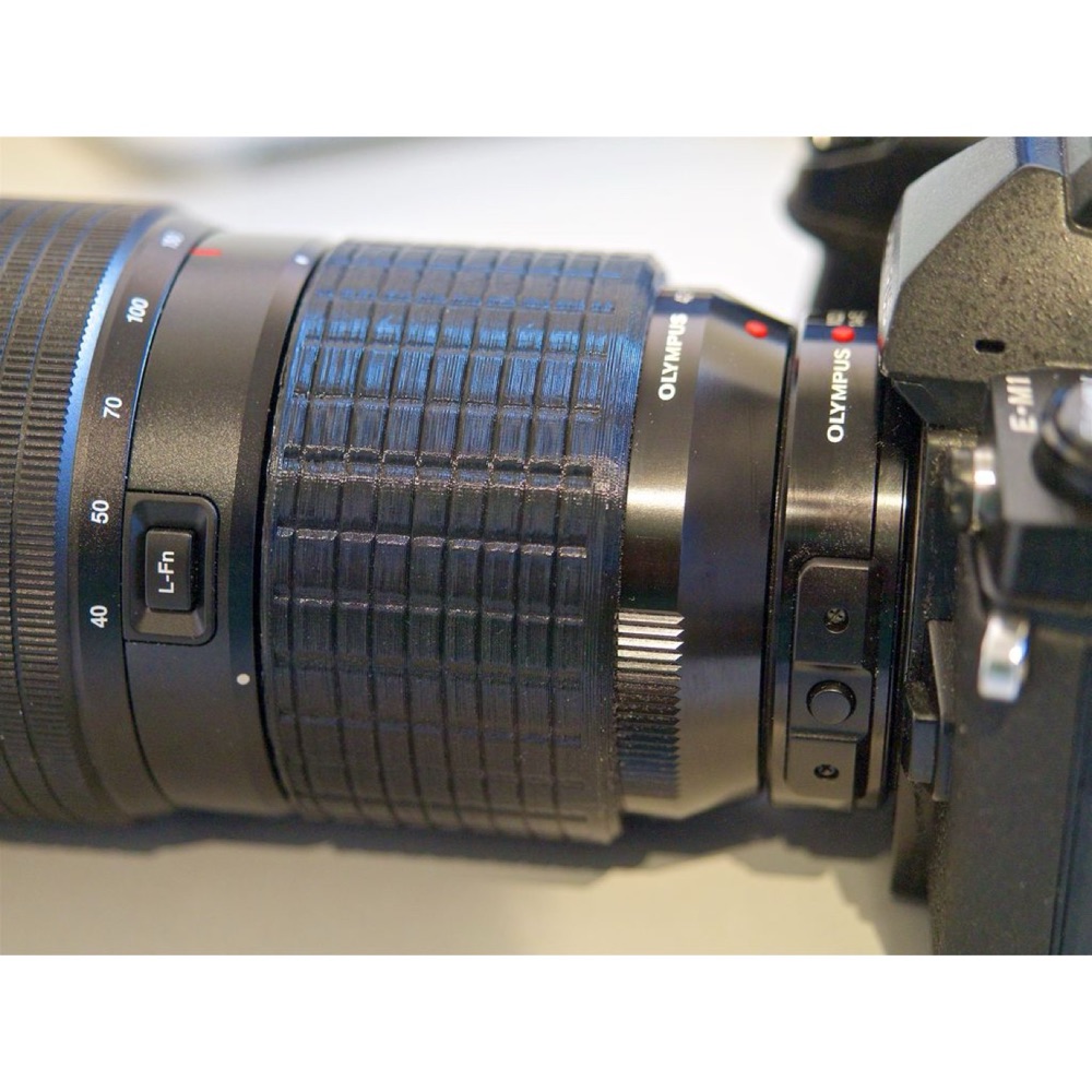 Olympus M.Zuiko 40-150mm f/2.8 Pro Tripod Halkası Kapağı ve Tutamağı görsel 2