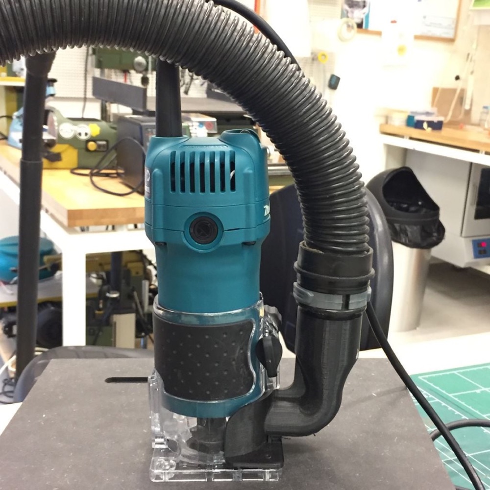 Makita RT0700CX4 Freze Toz Emiş Adaptörü görsel 1