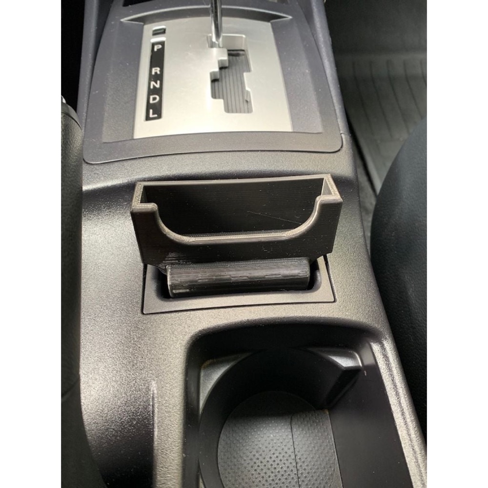Mitsubishi Lancer orta konsol telefon tutucusu
