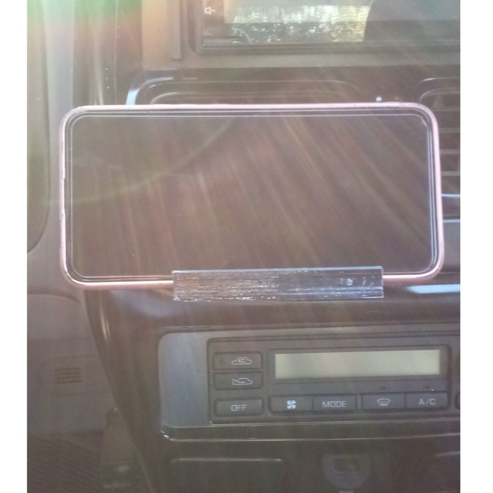 Nissan Navara D22 telefon tutucu görsel 3