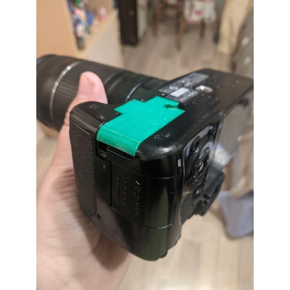 Canon 450D 500D 1000D battery door replacement