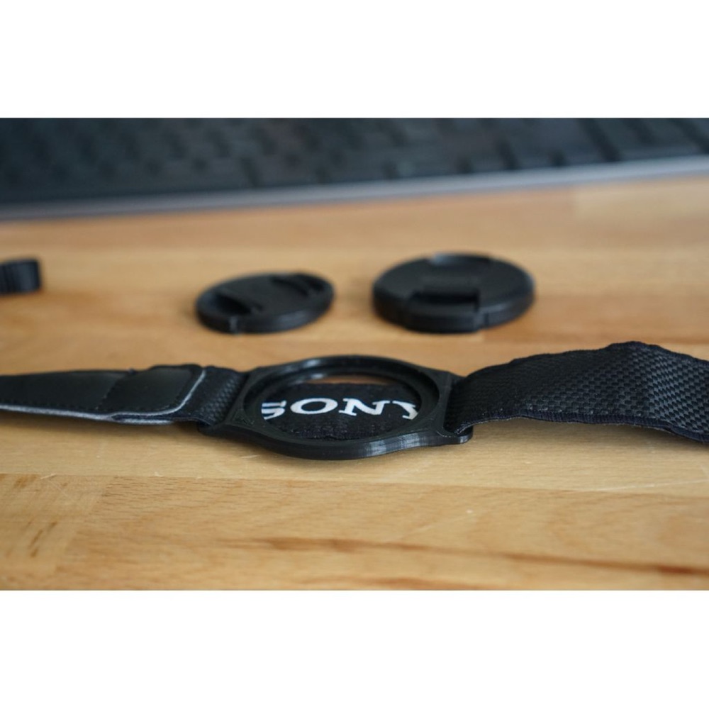 Sony a6000 Orijinal Askısına Takılan 40,5 mm ve 49 mm Objektif Kapağı Tutucusu görsel 3