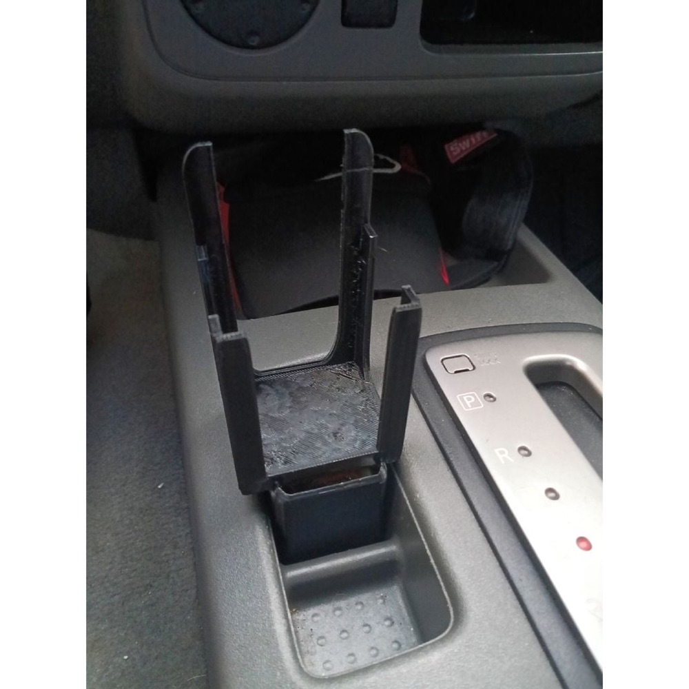 Nissan Frontier (2012) orta konsol el telsizi tutucusu görsel 2